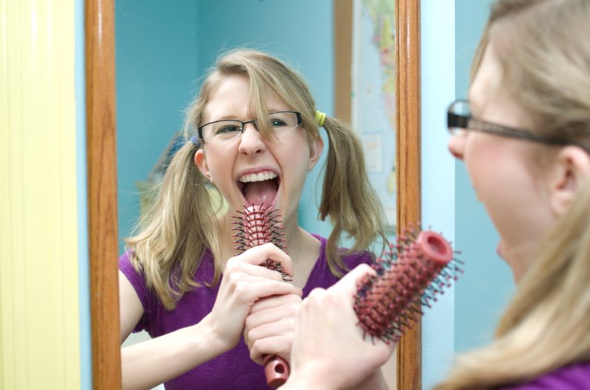 Girl Singing in Mirror